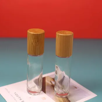 5db 10ml Vastag, átlátszó Üveg illóolaj Roll üveg, bambusz Fa fedél /Fém Görgős Labdát, Parfüm, Aromaterápia